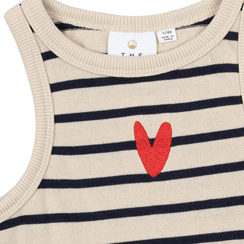 Striped sweater with a red heart design and visible brand label.
