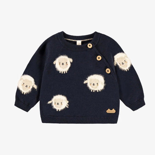 Navy blue sweater with sheep designs and buttons on a white background
